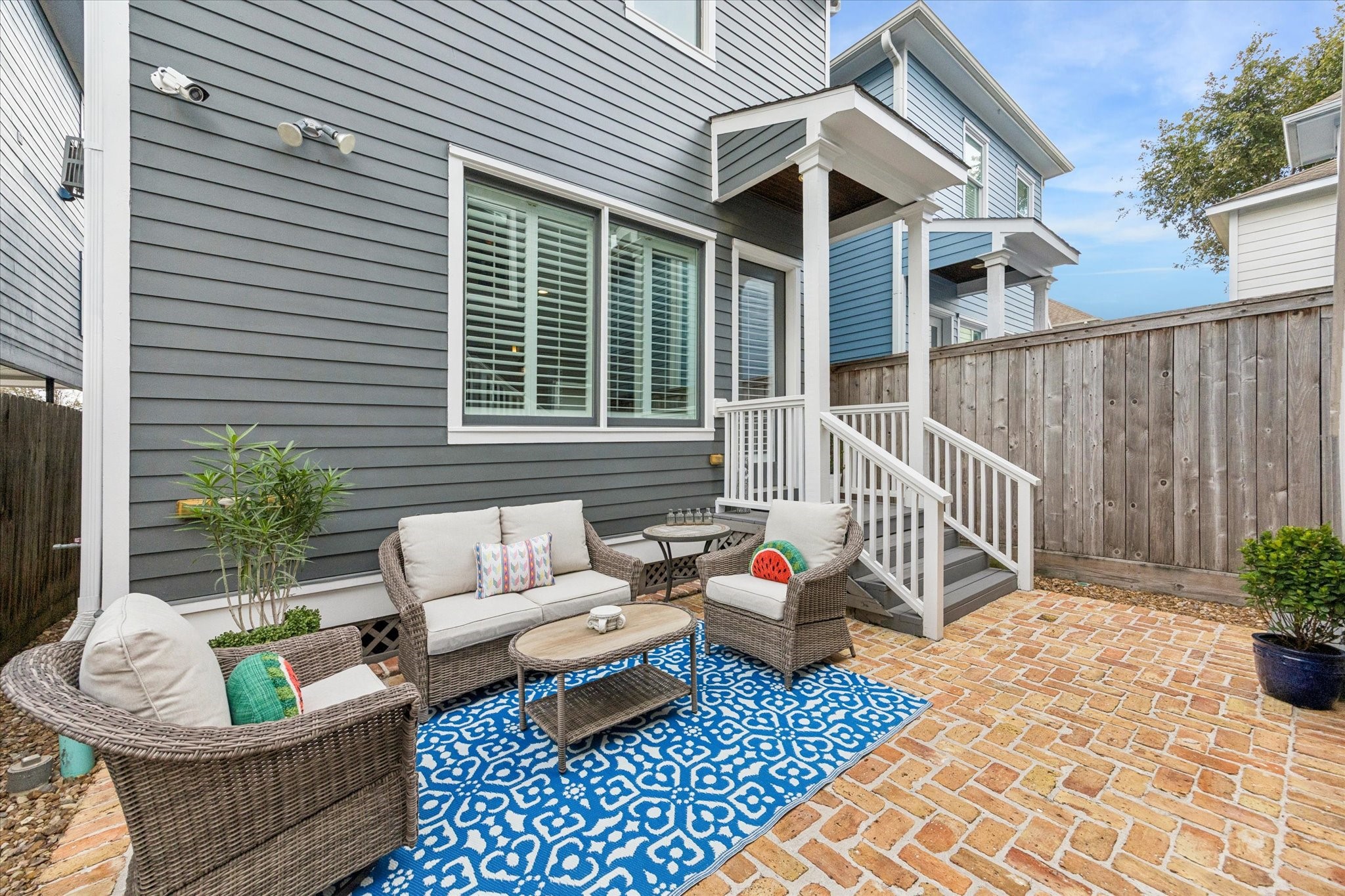 209 West 24th Street Houston, TX 77008 - Photo 6 of 36 This backyard provides a peaceful place to relax and enjoy the outdoors, with a herringbone brick design that adds character and sophistication.