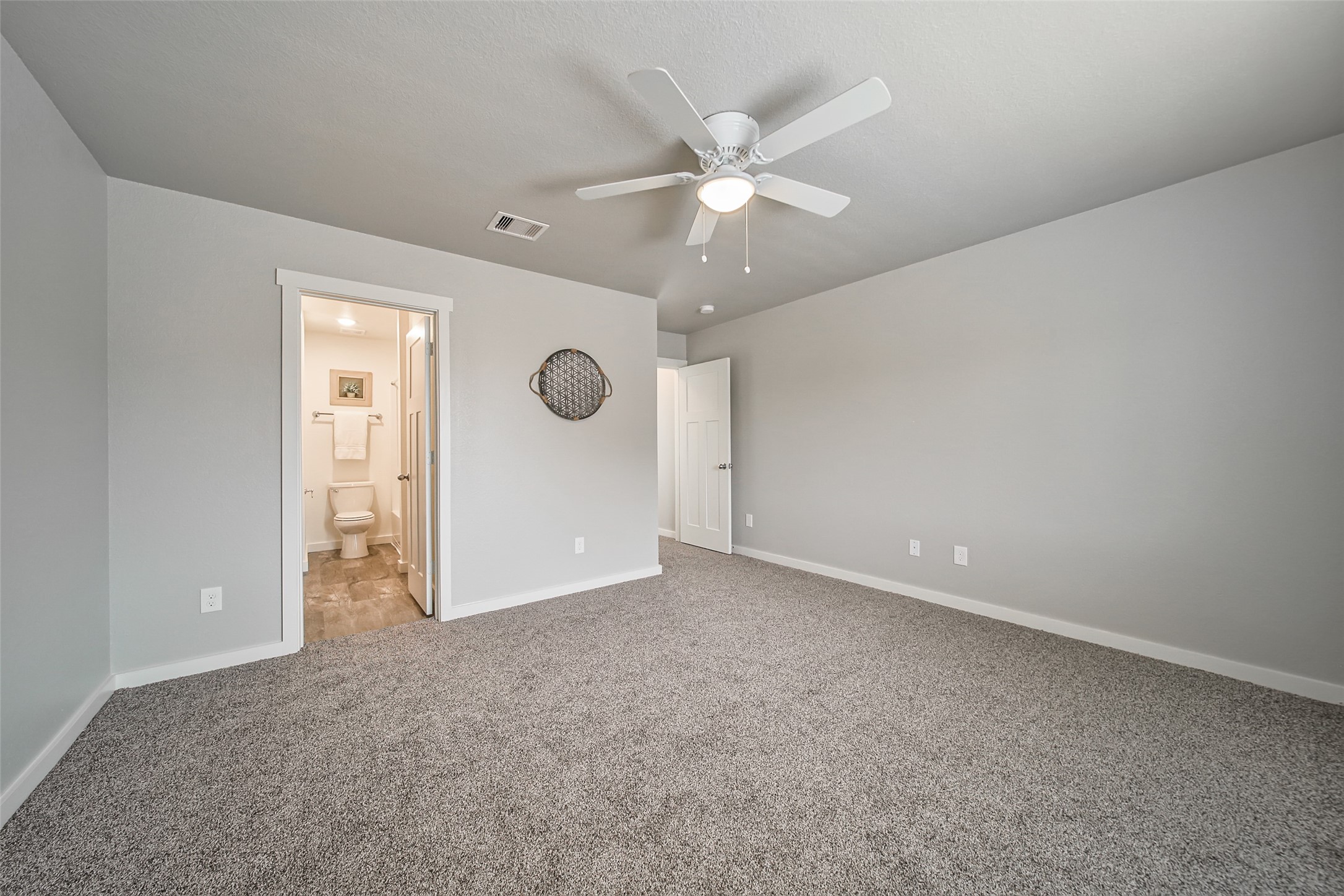 21155 Gosling Road, Unit 15 CD Spring, TX 77388 - Photo 11 of 34 an empty room with fan and windows