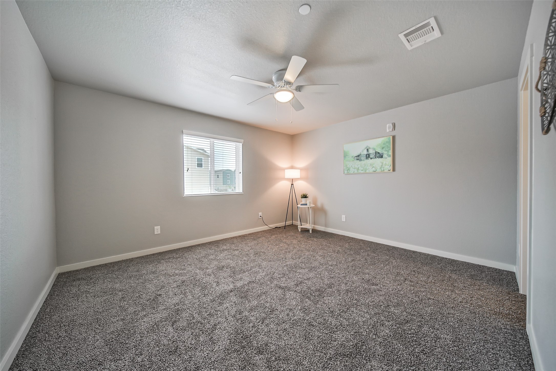 21155 Gosling Road, Unit 15 CD Spring, TX 77388 - Photo 20 of 34 a view of an empty room with a window
