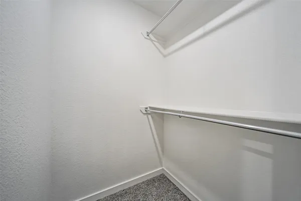 a view of a room with racks on the wall