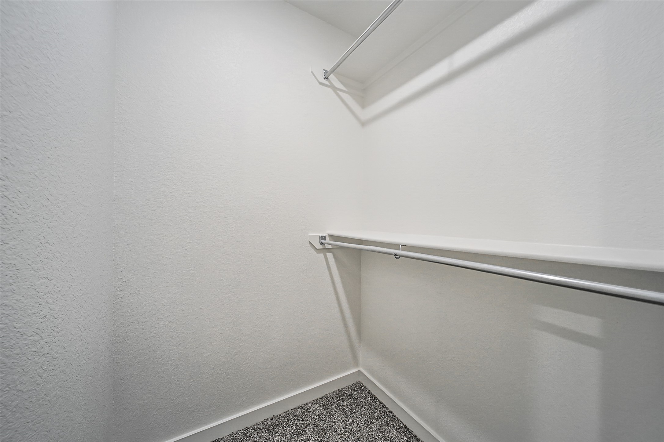 21155 Gosling Road, Unit 15 CD Spring, TX 77388 - Photo 24 of 34 a view of a room with racks on the wall