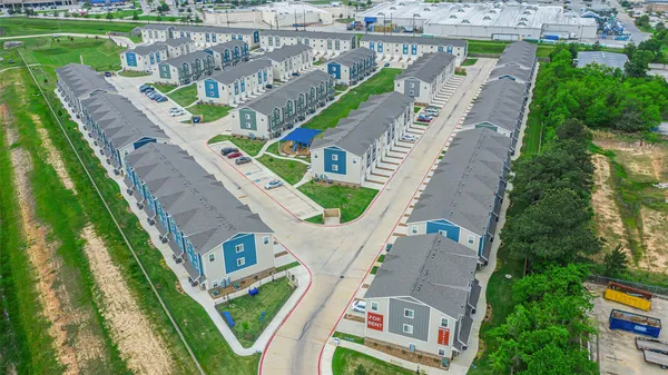 an aerial view of a house with a garden