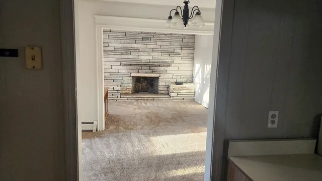 a view of a livingroom with a fireplace