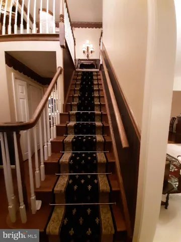 a bedroom with a bed and cabinets