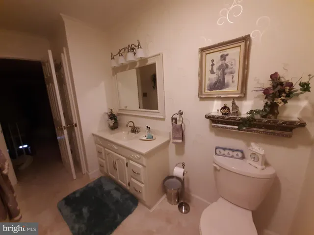 an aerial view of residential houses with outdoor space and swimming pool