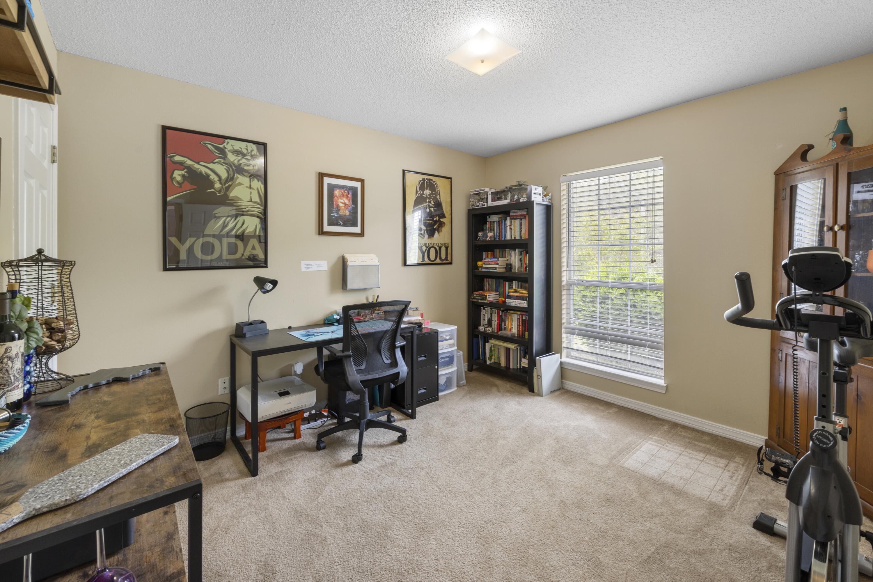 419 Bobby Drive Crestview, FL 32536 - Photo 26 of 42 a view of a livingroom with workspace and a window