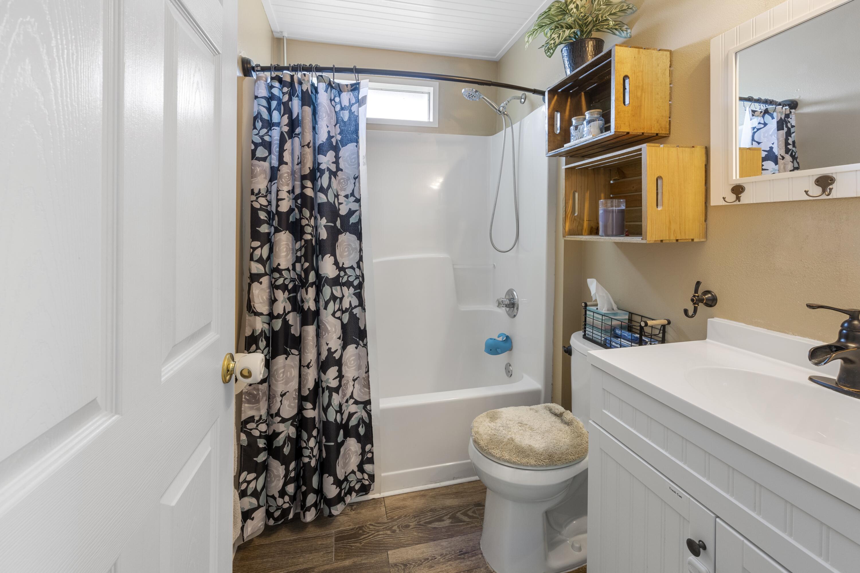 419 Bobby Drive Crestview, FL 32536 - Photo 28 of 42 a bathroom with a sink toilet and shower