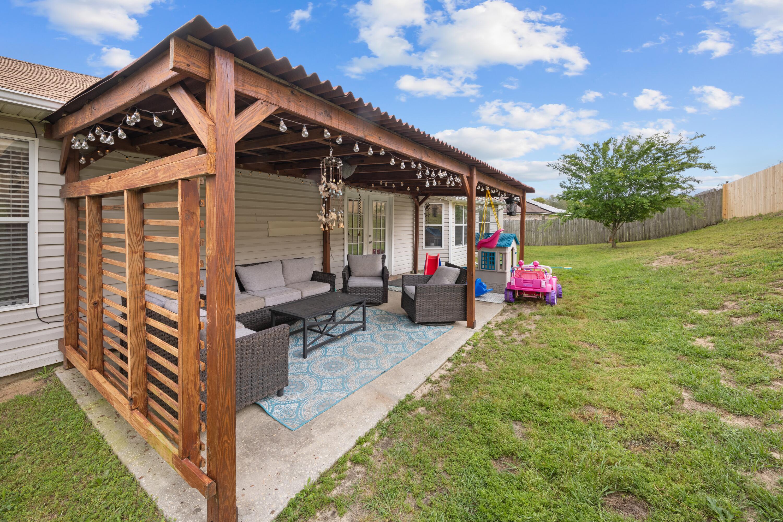 419 Bobby Drive Crestview, FL 32536 - Photo 34 of 42 a childrens park with lots of swings and slides