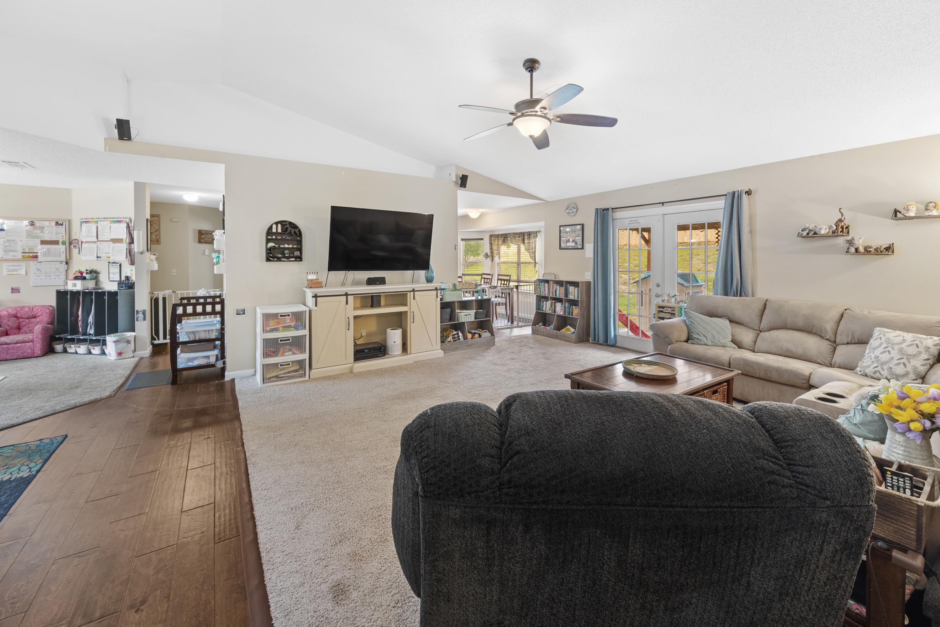 419 Bobby Drive Crestview, FL 32536 - Photo 6 of 42 a living room with furniture and a flat screen tv