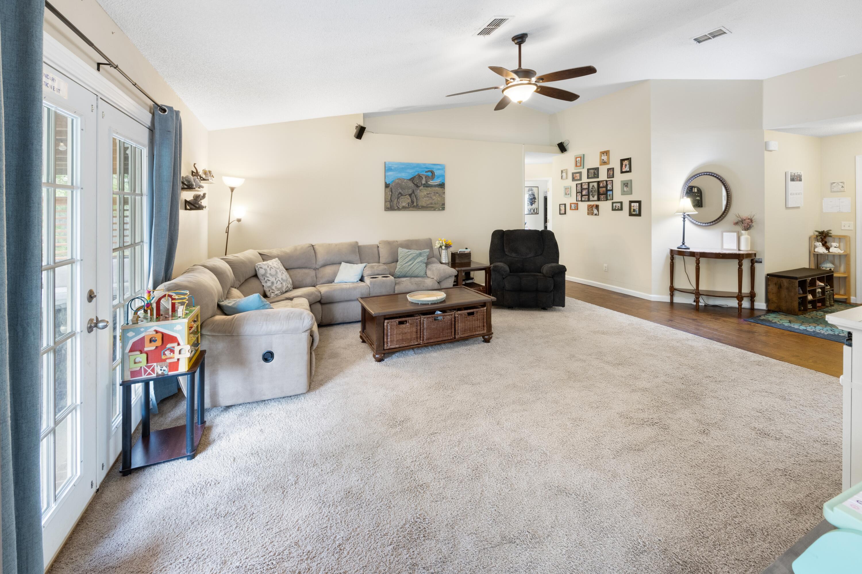 419 Bobby Drive Crestview, FL 32536 - Photo 8 of 42 a living room with furniture and a window