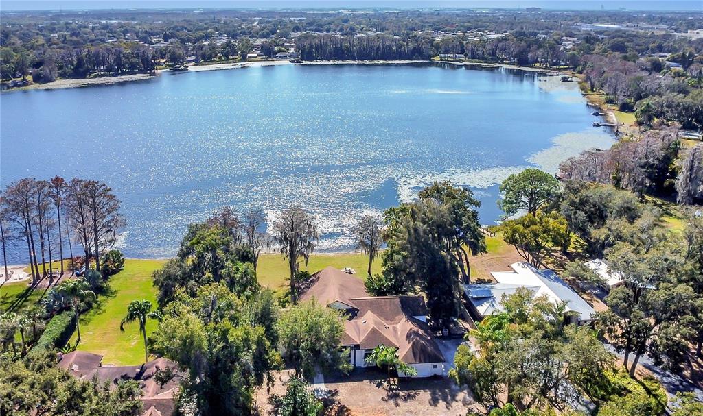 an aerial view of a houses with outdoor space
