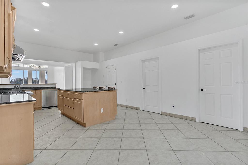 336 Mary Jess Road Orlando, FL 32839 - Photo 16 of 63 a view of kitchen with white cabinets