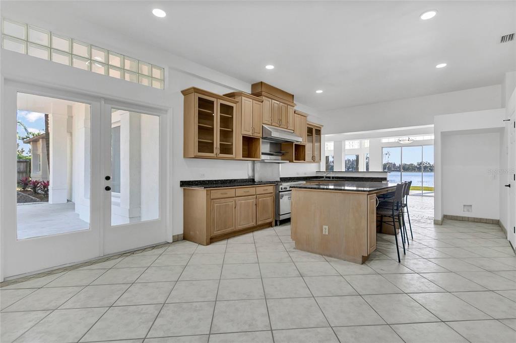 336 Mary Jess Road Orlando, FL 32839 - Photo 17 of 63 a kitchen with a sink a counter top space cabinets and stainless steel appliances