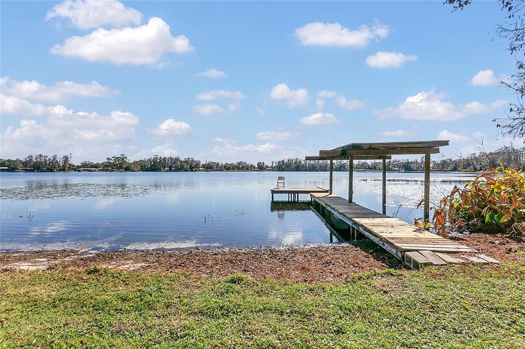 336 Mary Jess Road Orlando, FL 32839 - Photo 54 of 63 a view of a lake with outside space