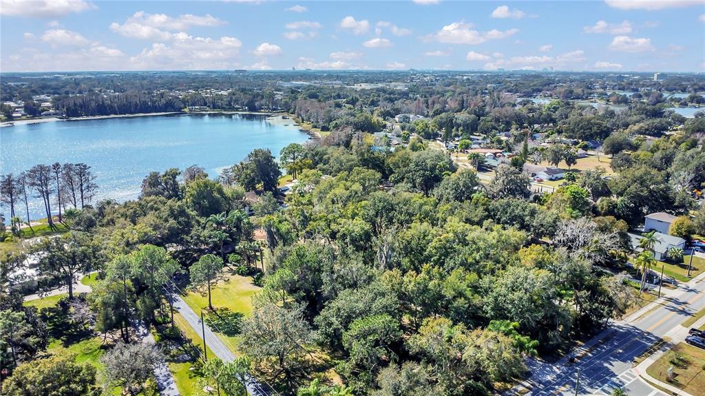 336 Mary Jess Road Orlando, FL 32839 - Photo 56 of 63 an aerial view of a residential houses with outdoor space and lake view
