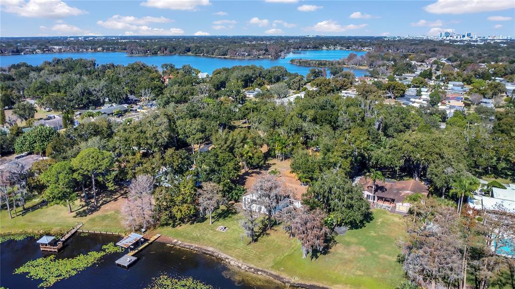 336 Mary Jess Road Orlando, FL 32839 - Photo 60 of 63 an aerial view of a residential houses with outdoor space and trees