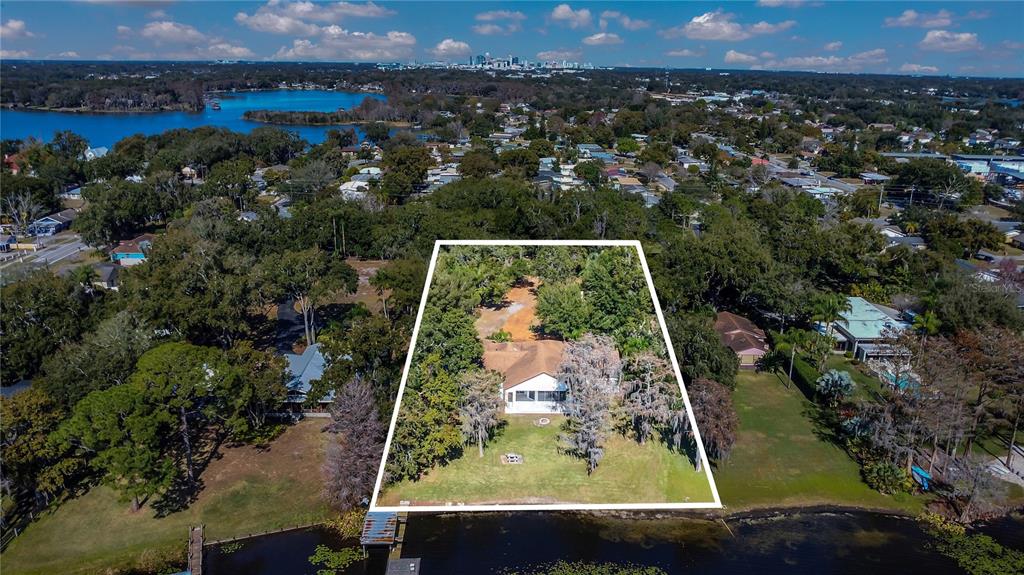 336 Mary Jess Road Orlando, FL 32839 - Photo 63 of 63 an aerial view of a residential houses with outdoor space and trees