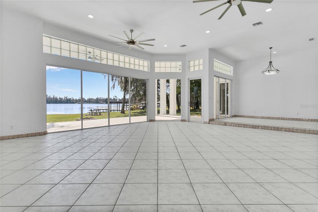 336 Mary Jess Road Orlando, FL 32839 - Photo 9 of 63 a view of an empty room and chandelier fan