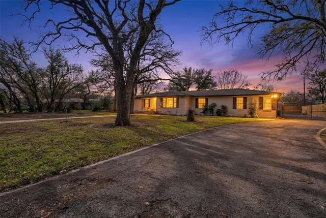 a view of house with outdoor space
