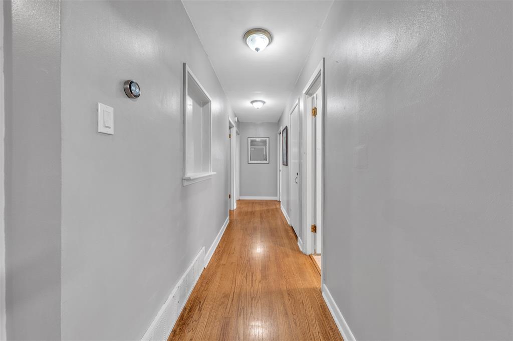 106 Lakeridge Road Lakeside, TX 76108 - Photo 17 of 40 a view of a hallway with wooden floor