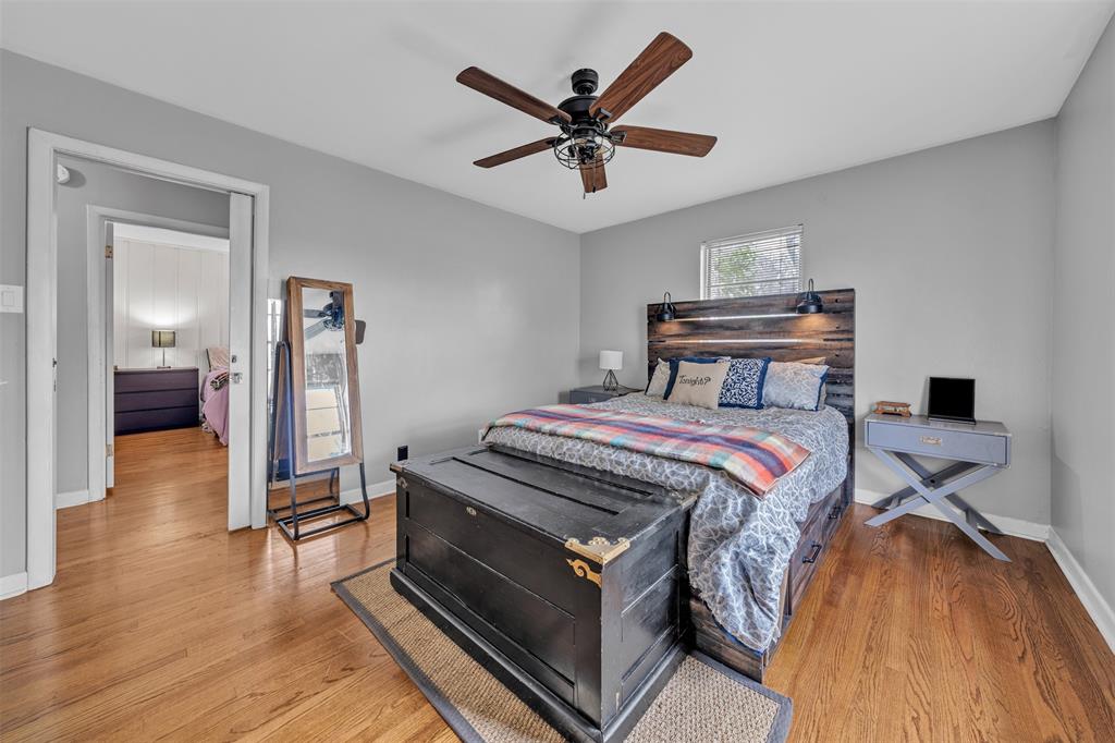 106 Lakeridge Road Lakeside, TX 76108 - Photo 24 of 40 a bedroom with a bed and a ceiling fan