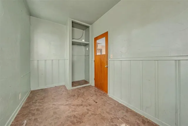 a view of a patio with table and chairs potted plants with wooden floor
