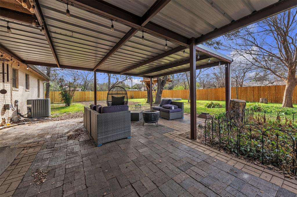106 Lakeridge Road Lakeside, TX 76108 - Photo 31 of 40 a view of a patio with table and chairs potted plants with wooden floor