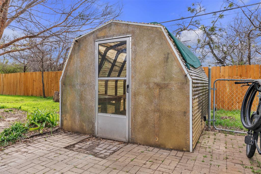106 Lakeridge Road Lakeside, TX 76108 - Photo 33 of 40 a view of a door and a sink in a backyard