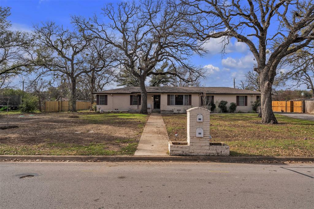 106 Lakeridge Road Lakeside, TX 76108 - Photo 37 of 40 front view of a house with a iron fence
