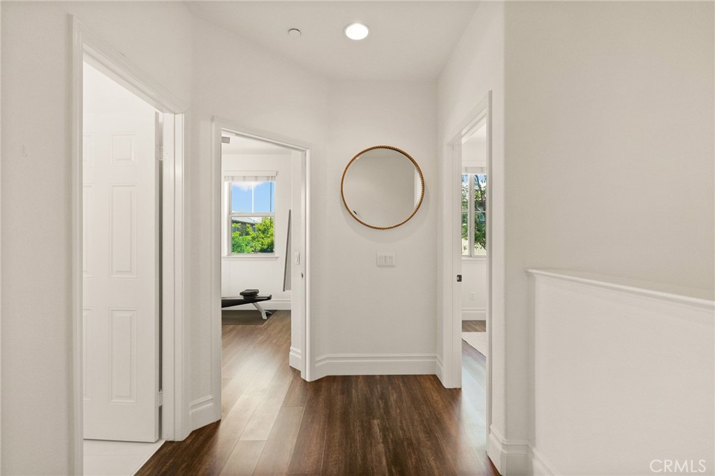 6807 Simmons Way Moorpark, CA 93021 - Photo 15 of 43 a view of room with wooden floor and bathroom