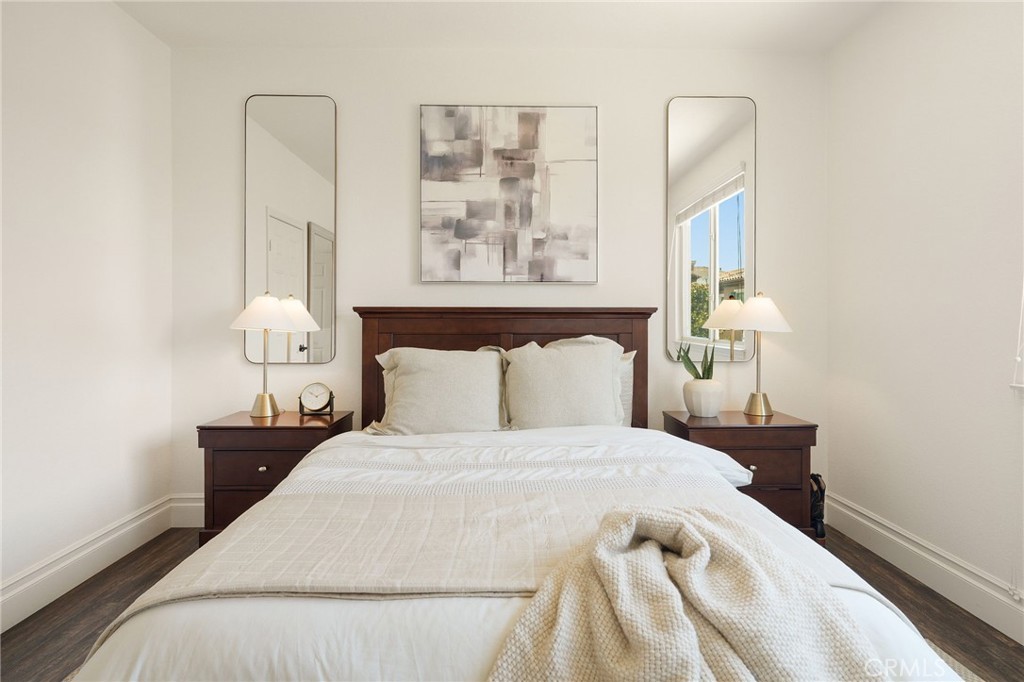 6807 Simmons Way Moorpark, CA 93021 - Photo 16 of 43 a bedroom with a bed and a night stand