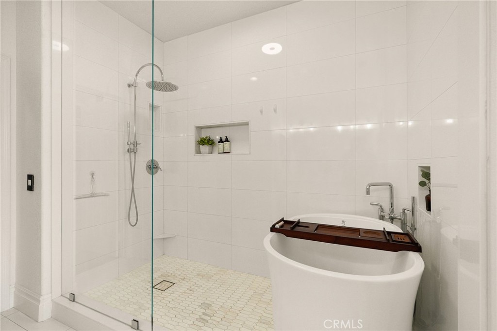 6807 Simmons Way Moorpark, CA 93021 - Photo 22 of 43 a bathroom with a sink a toilet and shower