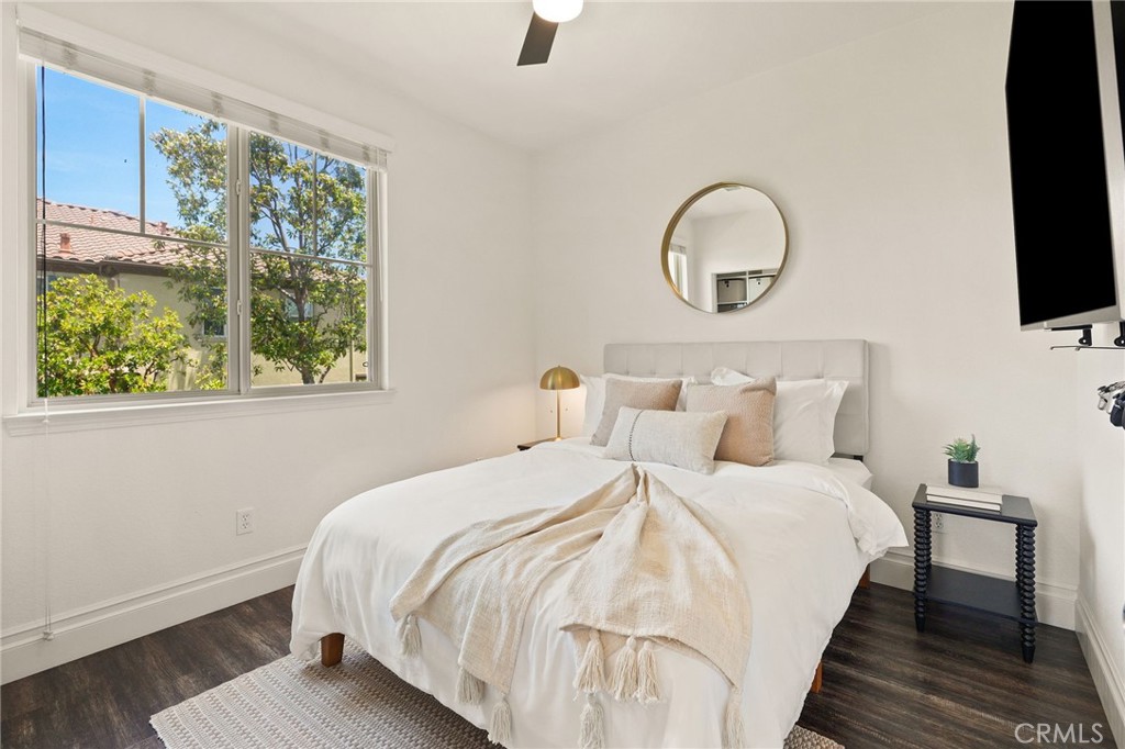 6807 Simmons Way Moorpark, CA 93021 - Photo 23 of 43 a bedroom with bed and a flat tv screen on dresser