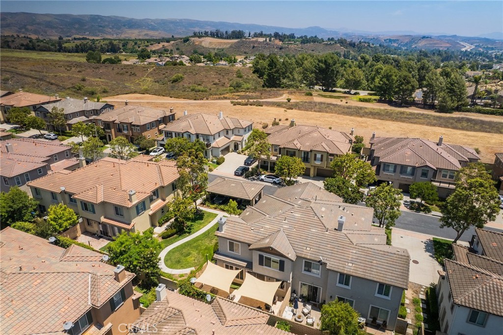 6807 Simmons Way Moorpark, CA 93021 - Photo 35 of 43 an aerial view of residential houses with outdoor space and river