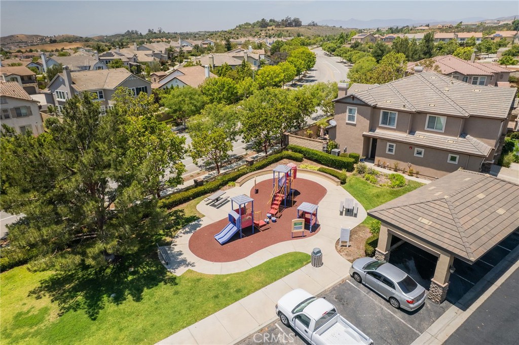 6807 Simmons Way Moorpark, CA 93021 - Photo 40 of 43 an aerial view of a house with garden space and lake view