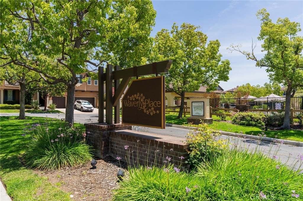 6807 Simmons Way Moorpark, CA 93021 - Photo 42 of 43 a front view of a house with a yard