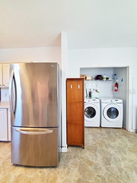 29200 South Jones Loop Road, Unit 125 Punta Gorda, FL 33950 - Photo 39 of 52 a utility room with dryer and washer