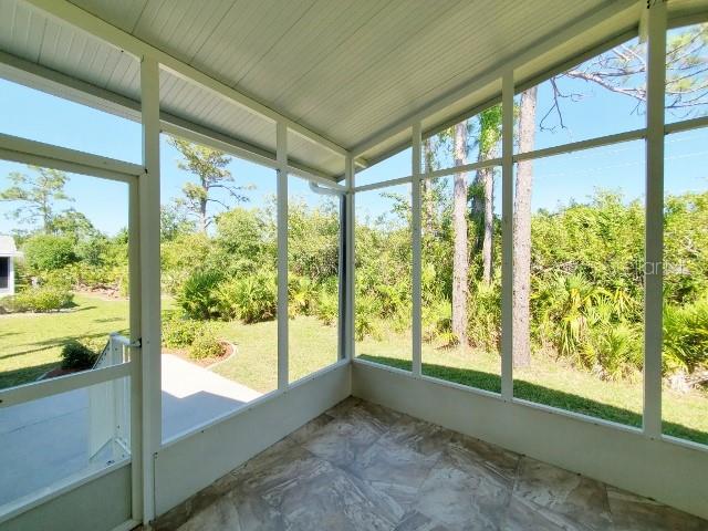 29200 South Jones Loop Road, Unit 125 Punta Gorda, FL 33950 - Photo 49 of 52 a view of an empty room and window