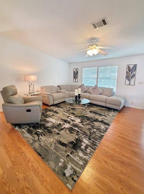 29200 South Jones Loop Road, Unit 125 Punta Gorda, FL 33950 - Photo 8 of 52 a living room with furniture
