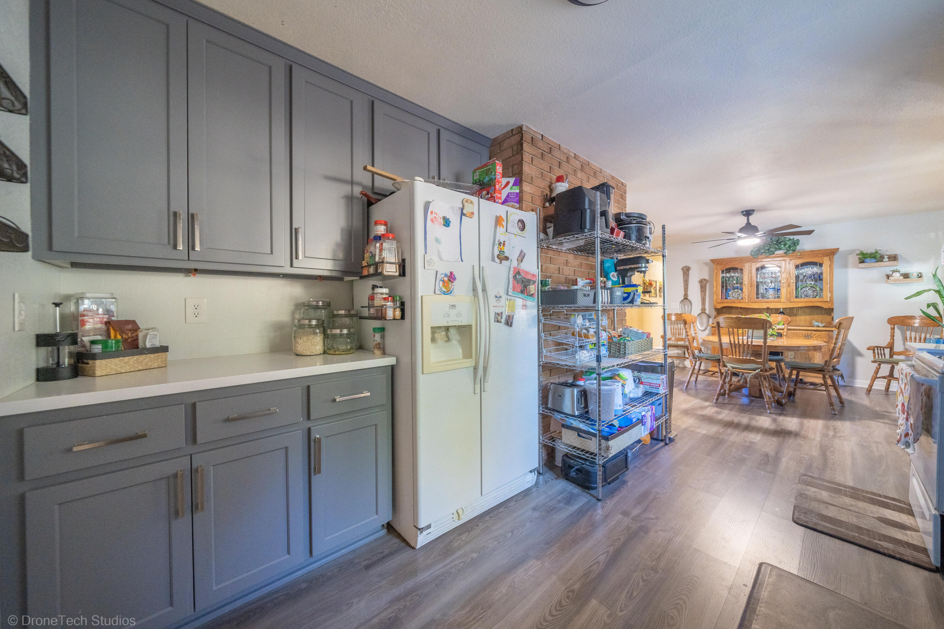 3059 Quartz Hill Road Redding, CA 96003 - Photo 16 of 64 a kitchen with stainless steel appliances granite countertop a refrigerator and microwave