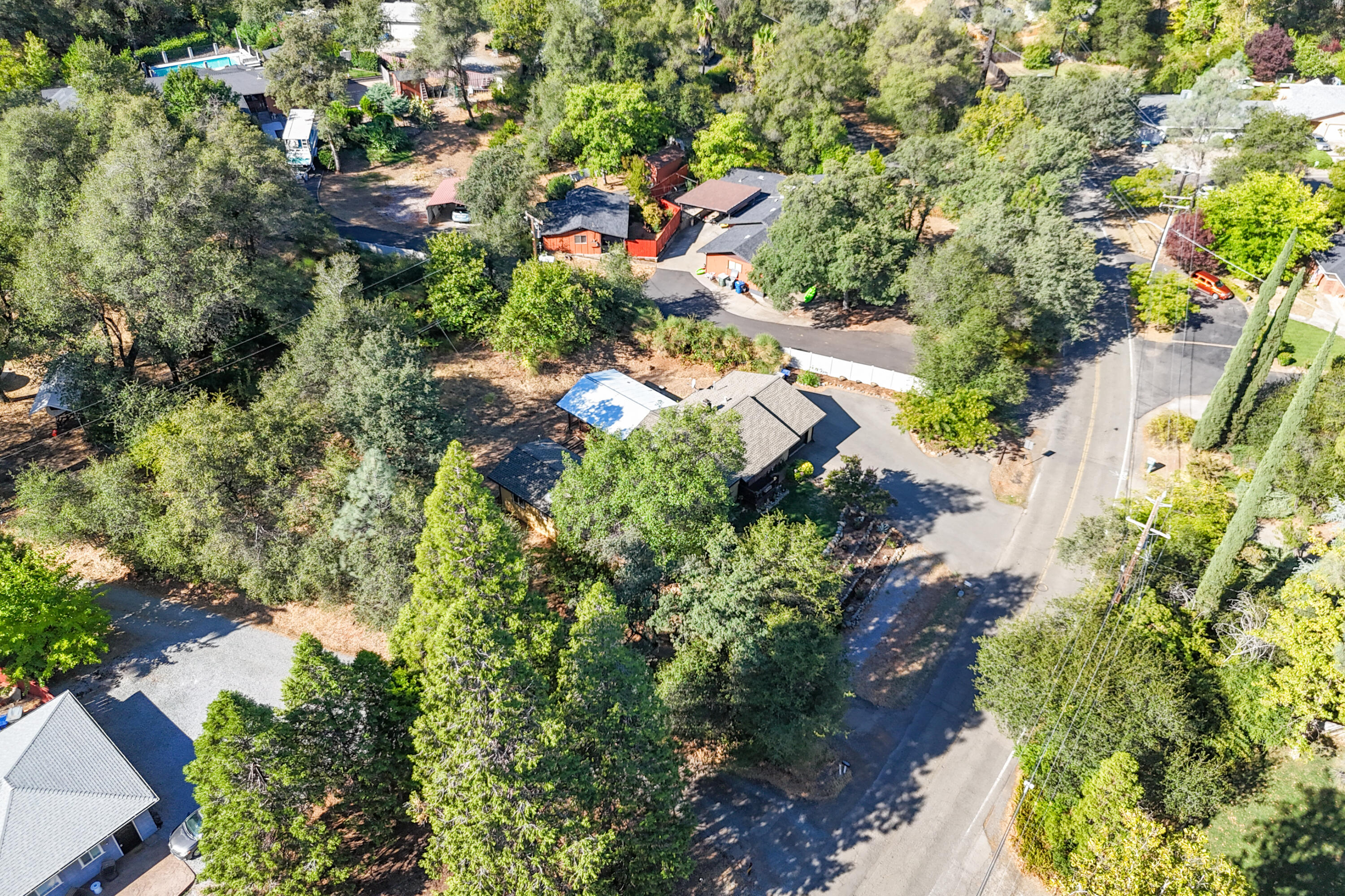 3059 Quartz Hill Road Redding, CA 96003 - Photo 42 of 64 an aerial view of residential house with outdoor space and trees all around