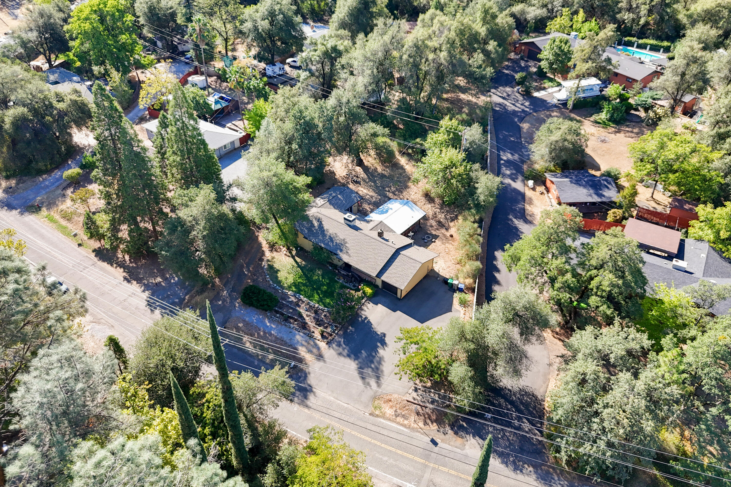 3059 Quartz Hill Road Redding, CA 96003 - Photo 44 of 64 an aerial view of residential houses with outdoor space