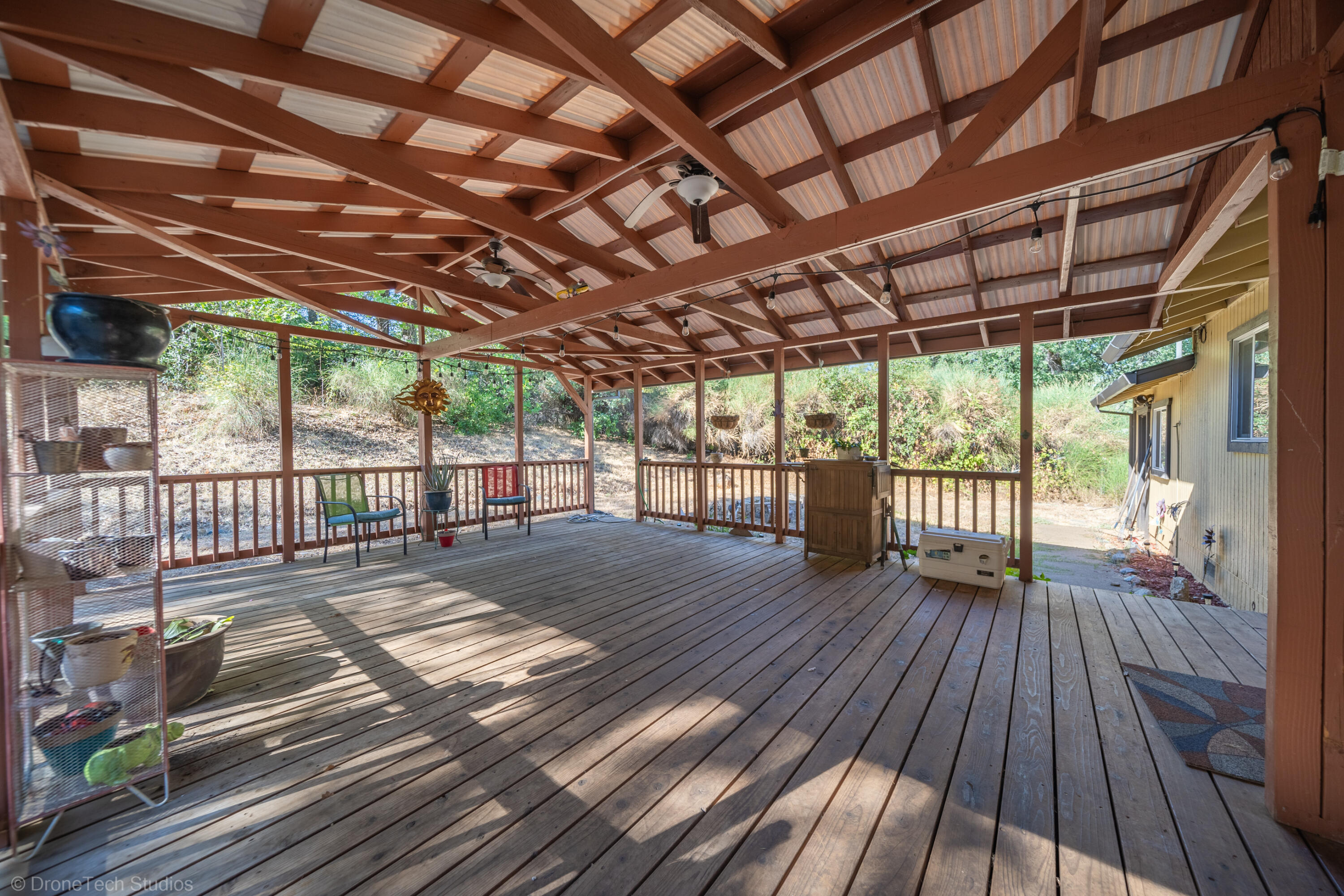 3059 Quartz Hill Road Redding, CA 96003 - Photo 49 of 64 a view of porch with wooden floor