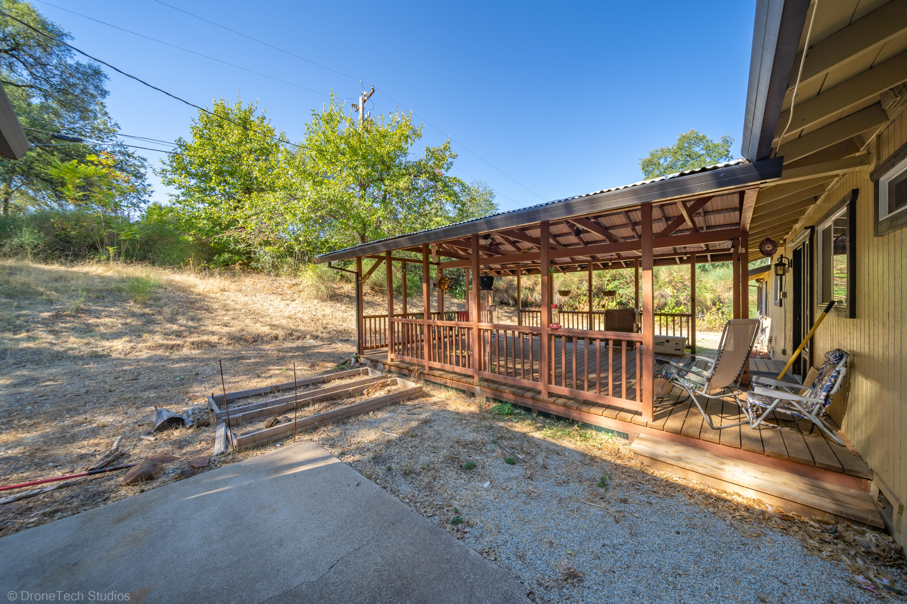 3059 Quartz Hill Road Redding, CA 96003 - Photo 55 of 64 a view of backyard with deck