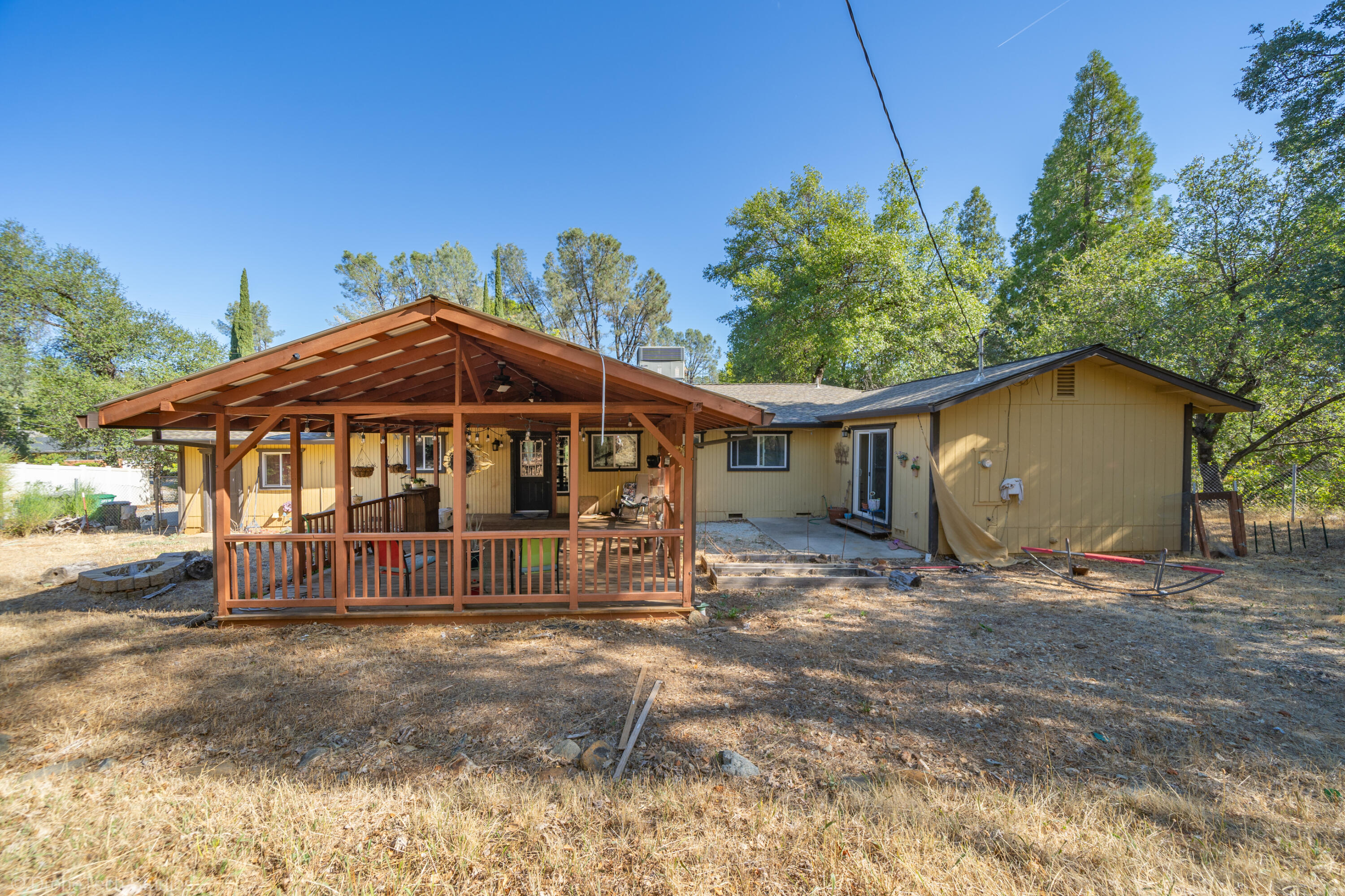 3059 Quartz Hill Road Redding, CA 96003 - Photo 58 of 64 a view of a house with a yard
