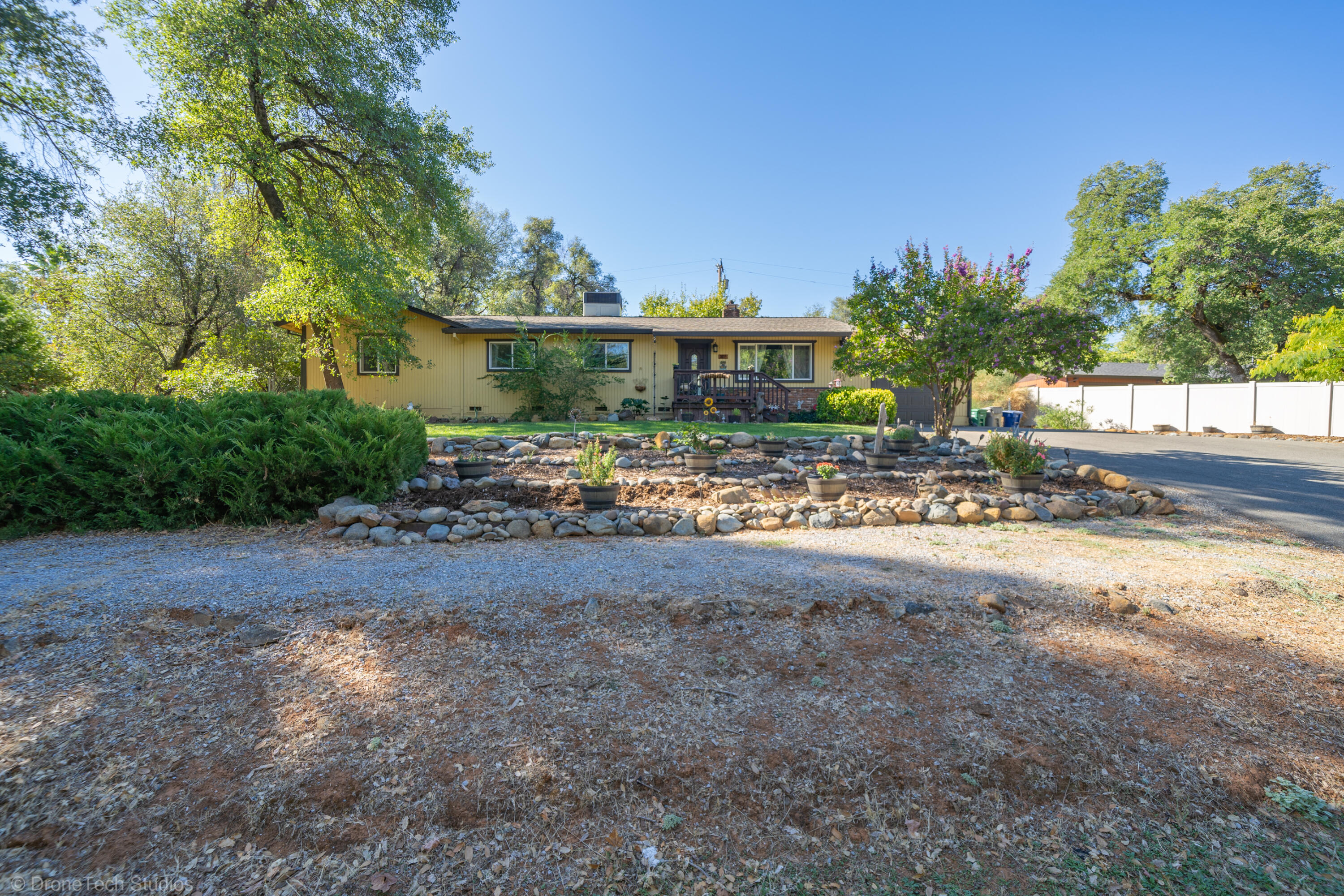 3059 Quartz Hill Road Redding, CA 96003 - Photo 62 of 64 a view of a yard with plants and trees