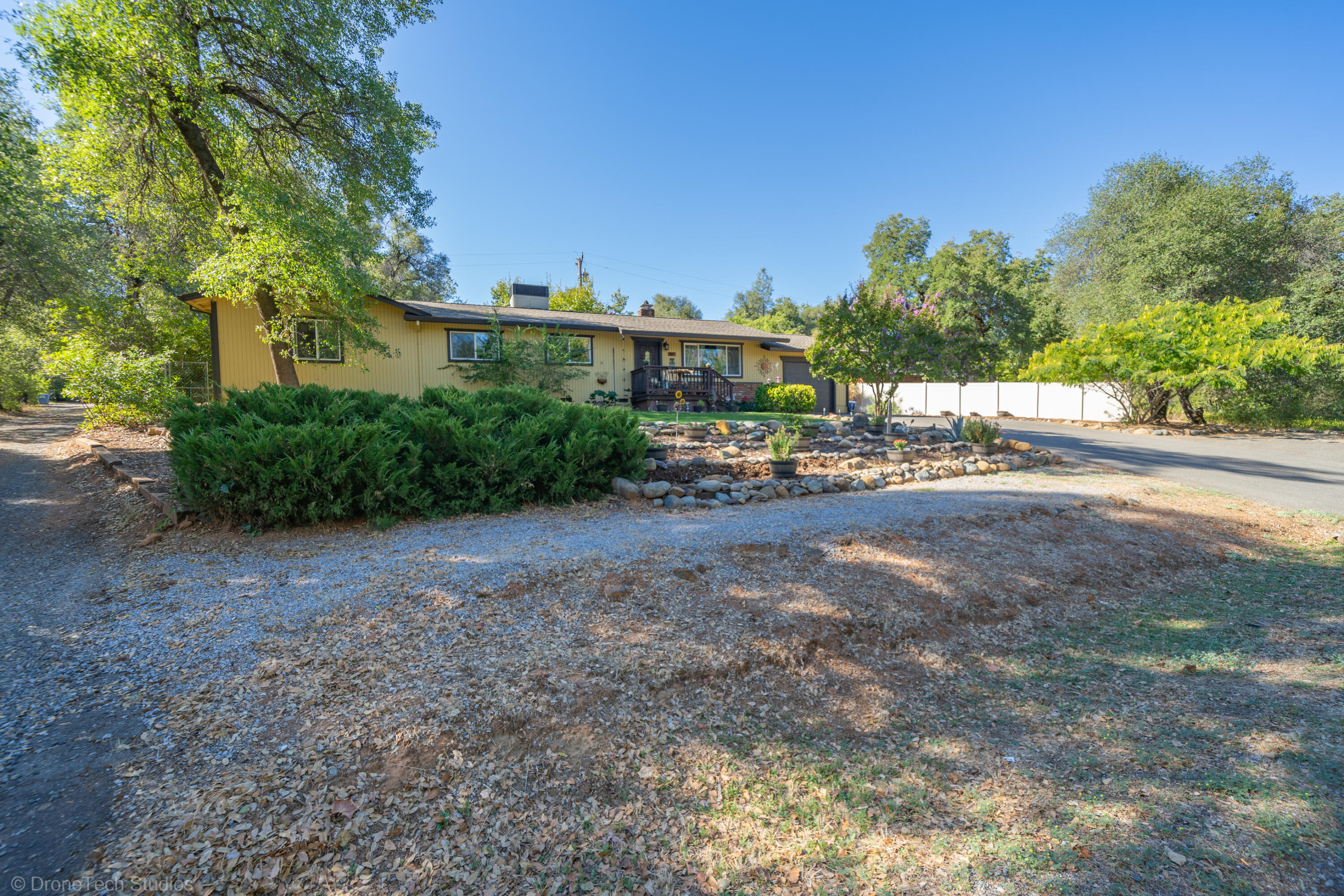3059 Quartz Hill Road Redding, CA 96003 - Photo 63 of 64 a view of a road with a building in the background