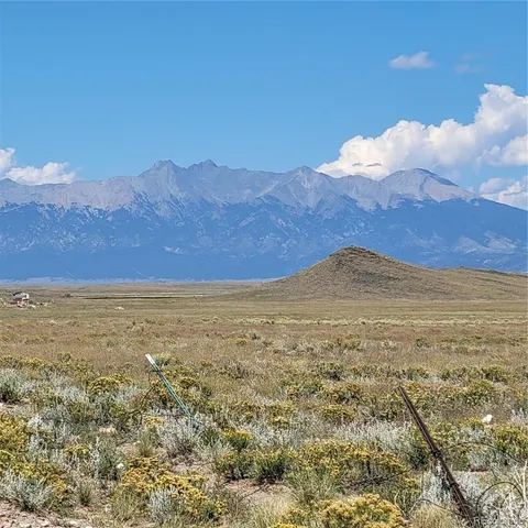a view of ocean and mountain