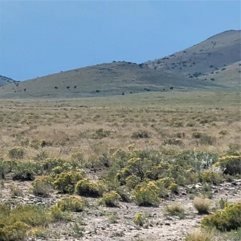 a view of ocean and mountains