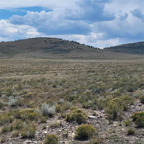 a view of beach and mountain